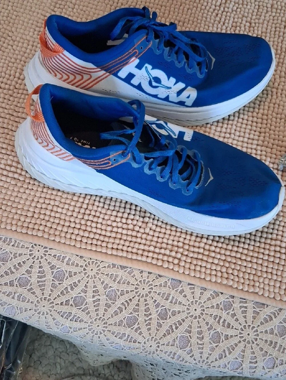 Hoka Blue and White Men's Running Shoes with Orange Accents